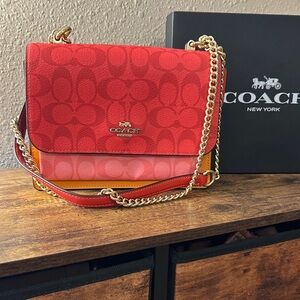 Coach Klare Crossbody Bag in Blocked Signature Canvas.